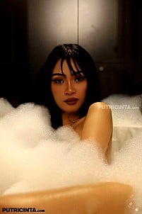 In the jacuzzi, Ryn playfully teases while enjoying an ice cream cone