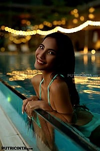 Sofia shows off her slim figure and striking curves while posing freely at pool
