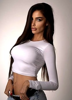 Claudia Sagrado image 2 of 2