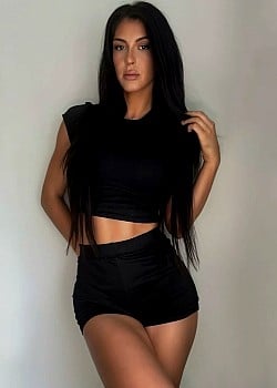 Mila Moore image 2 of 2