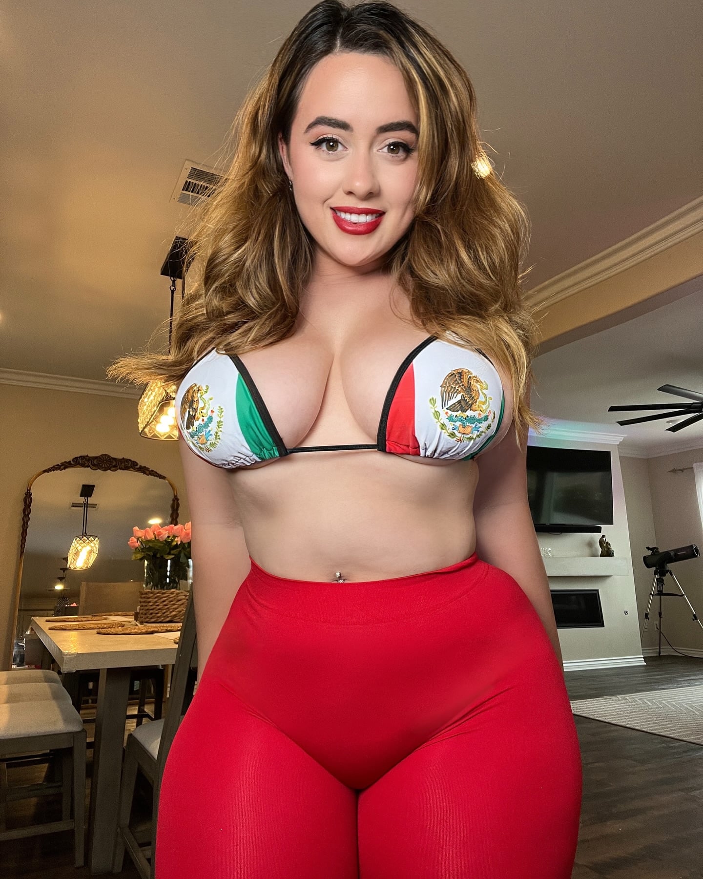 Veronica Rose XO in red dress