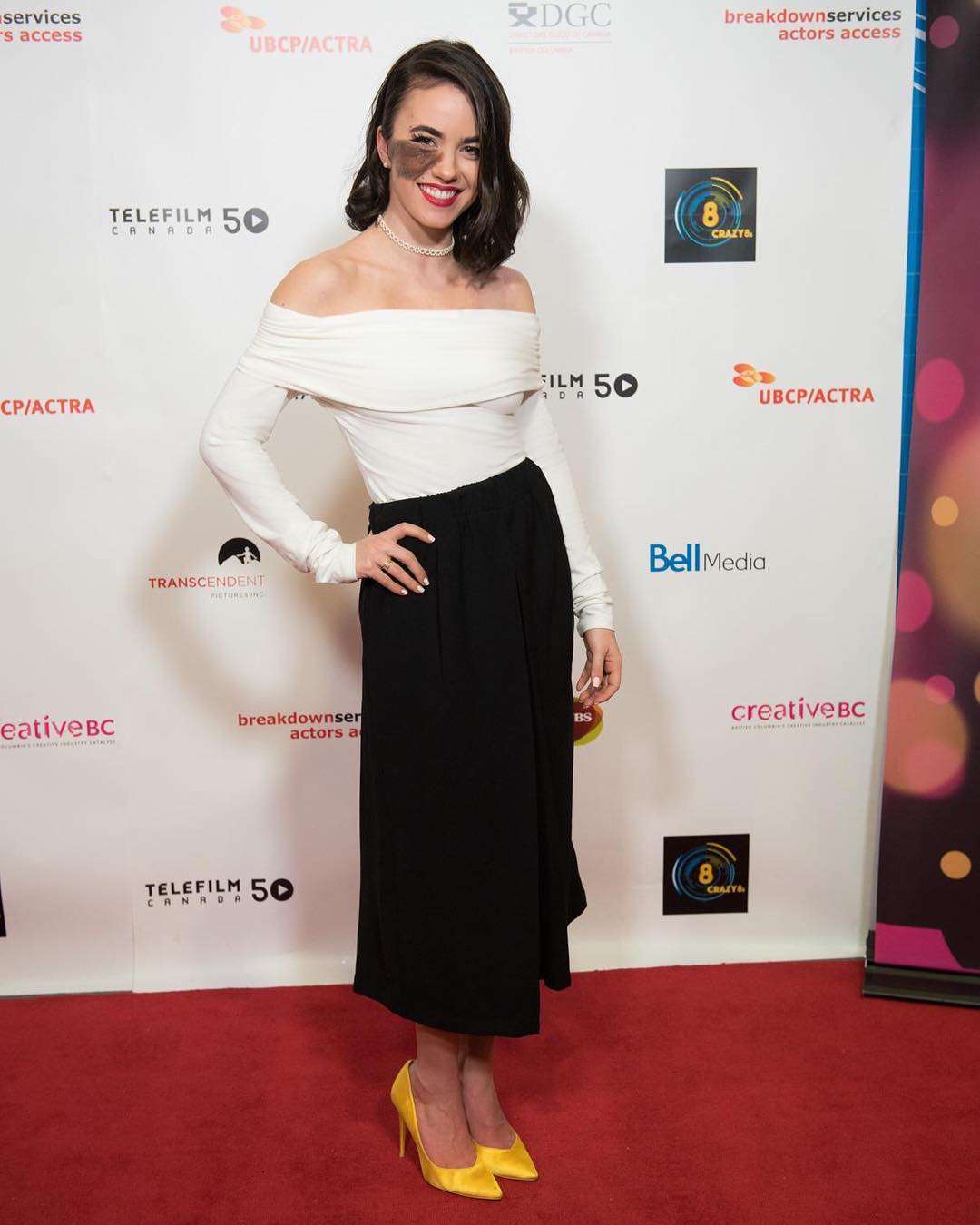 The woman arched her back in a sensual display