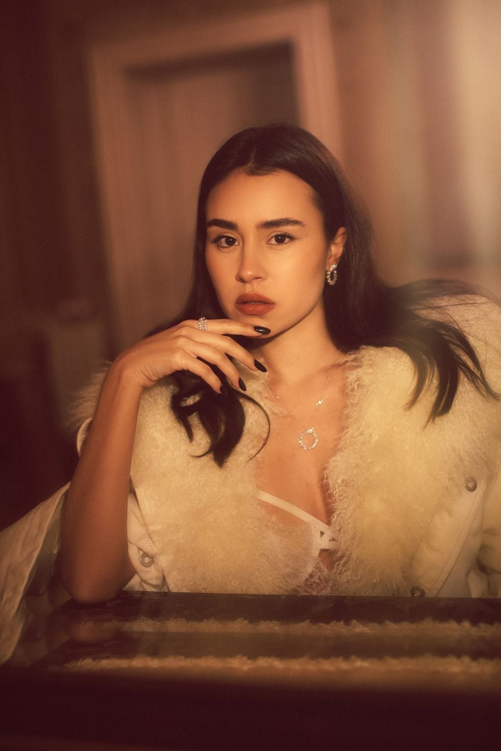 Her skin gleaming with a soft sheen